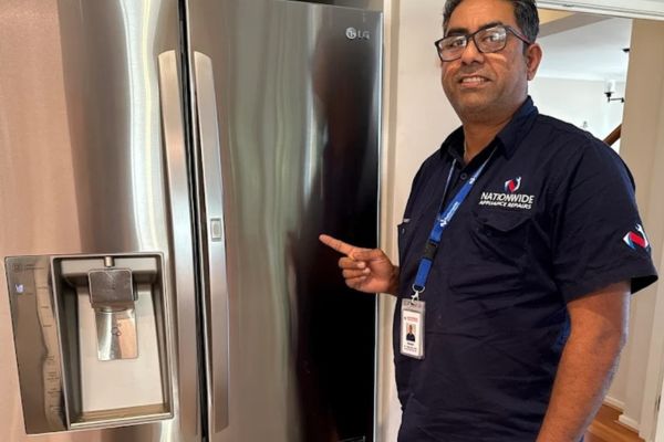 Technician after doing fridge repair in melbourne