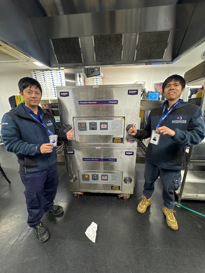 commercial pizza oven — specifically a double-deck electric pizza oven (deck oven type)