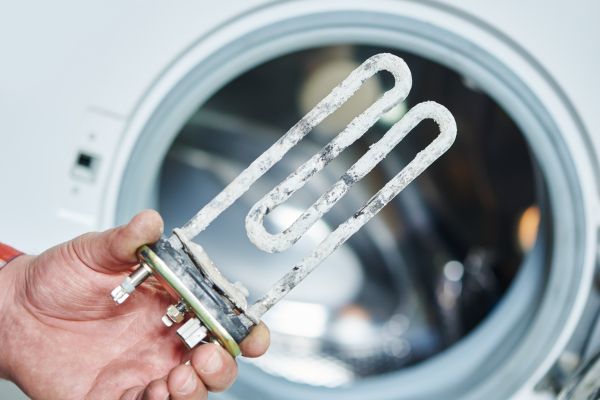 limescale buildup of washing machine heating element