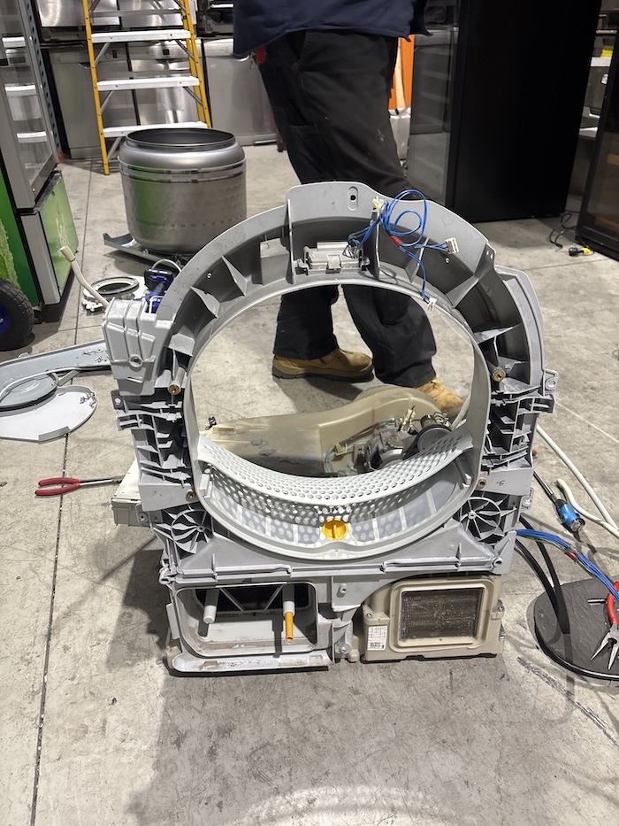 Outer drum housing of a front-load washing machine