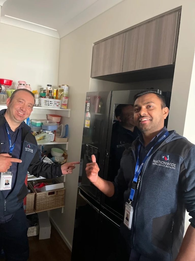 QAR Techs doing fridge repairs