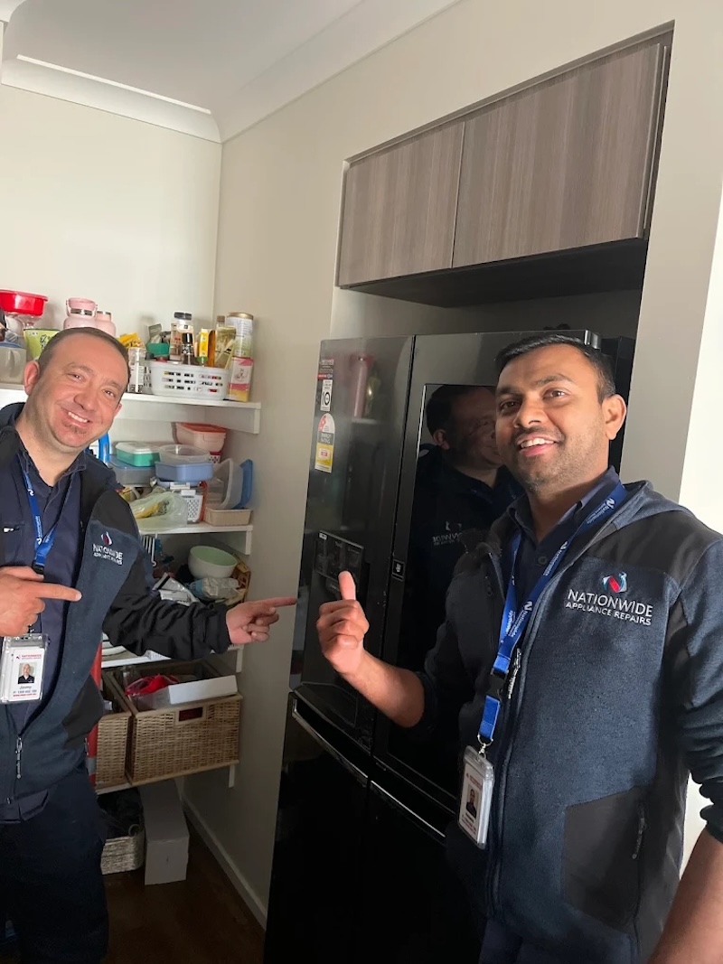 QAR Techs doing fridge repairs